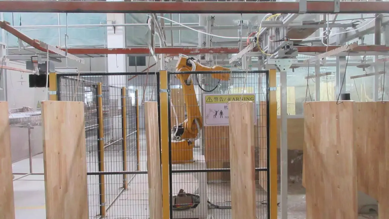 Automated robotic arm loading timber panels in wooden nursery furniture manufacturing factory (1)