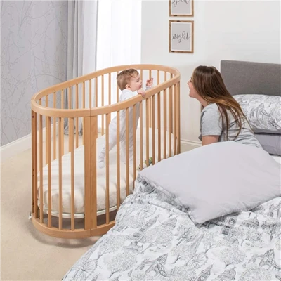 Lit bébé ovale